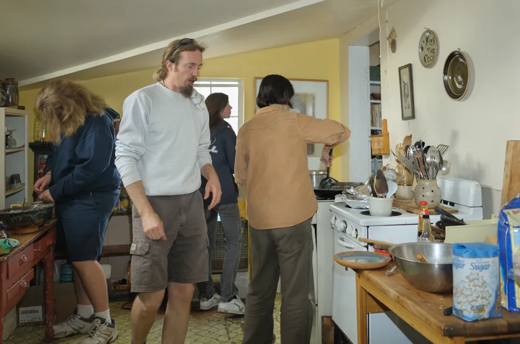 Jerry Hendershot (center), ceramics instructor from Boise