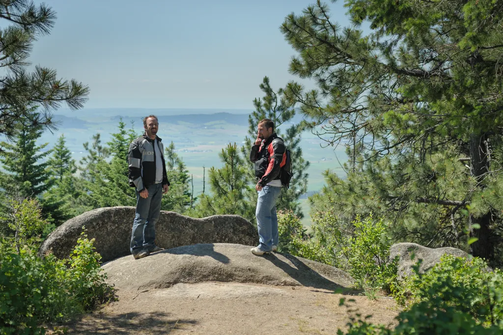 Brothers on a boulder
