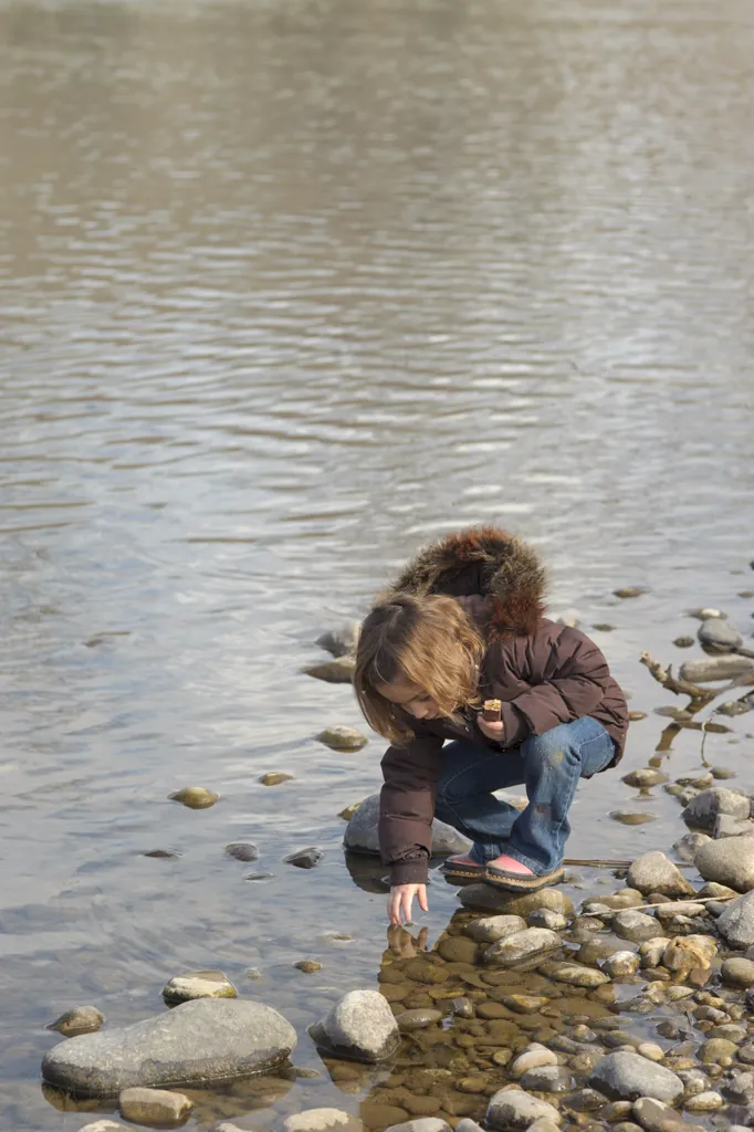 I see a little girl in the water